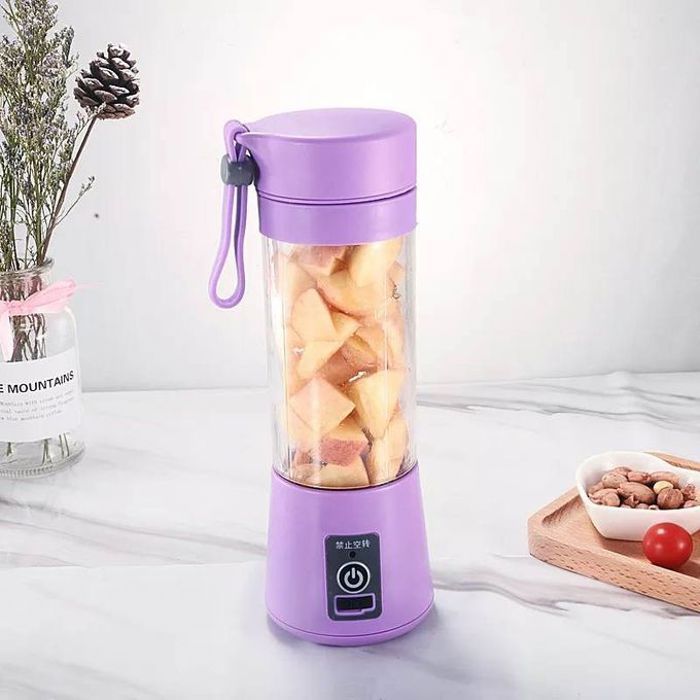 Mini presse-fruits portable, presse-agrumes électrique, rechargeable par USB, idéale pour vos jus frais.