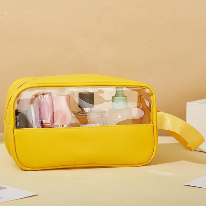 Trousse de toilette étanche fermeture métallique et transparente pour le voyage. Jaune