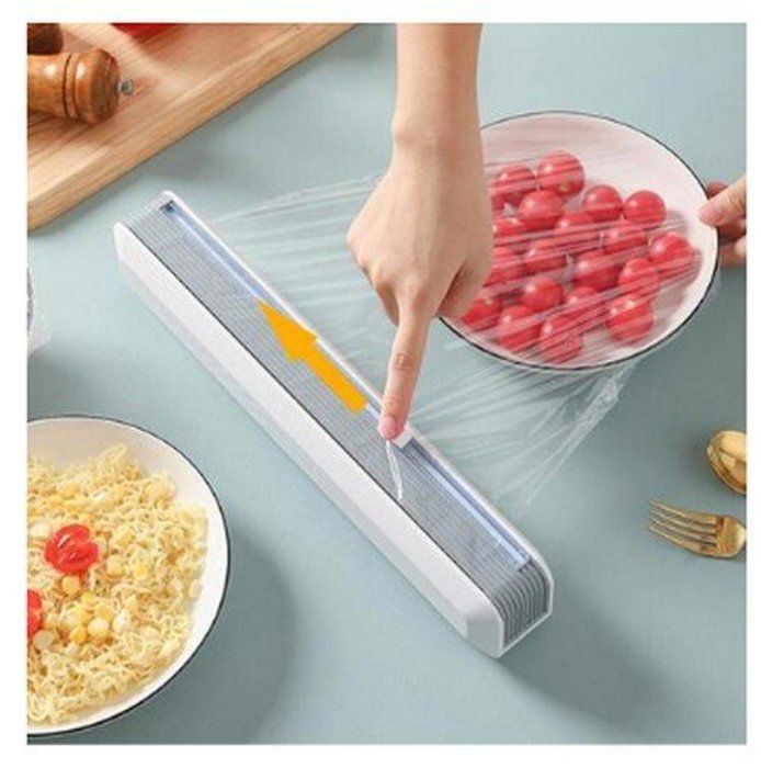 Distributeur d'emballages en plastique avec cutter