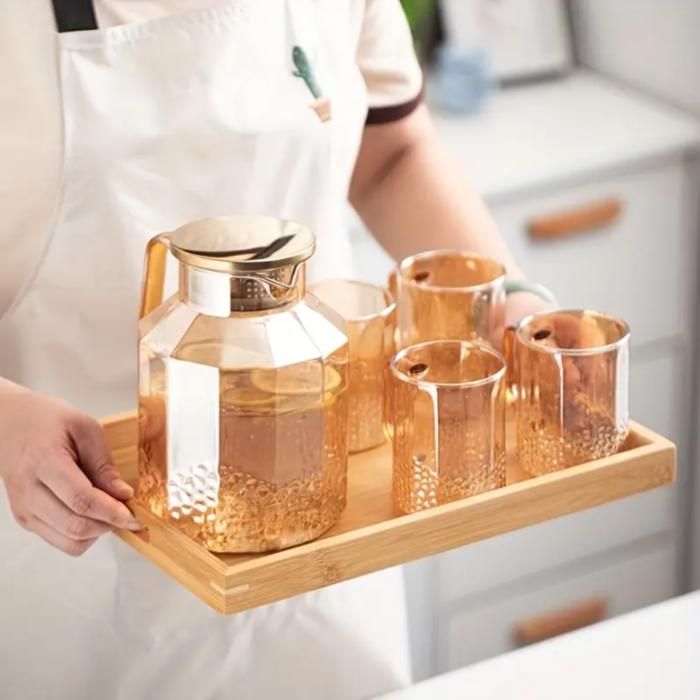 Carafe élégante avec 6 verres – Idéale pour servir jus et boissons fraîches au quotidien.